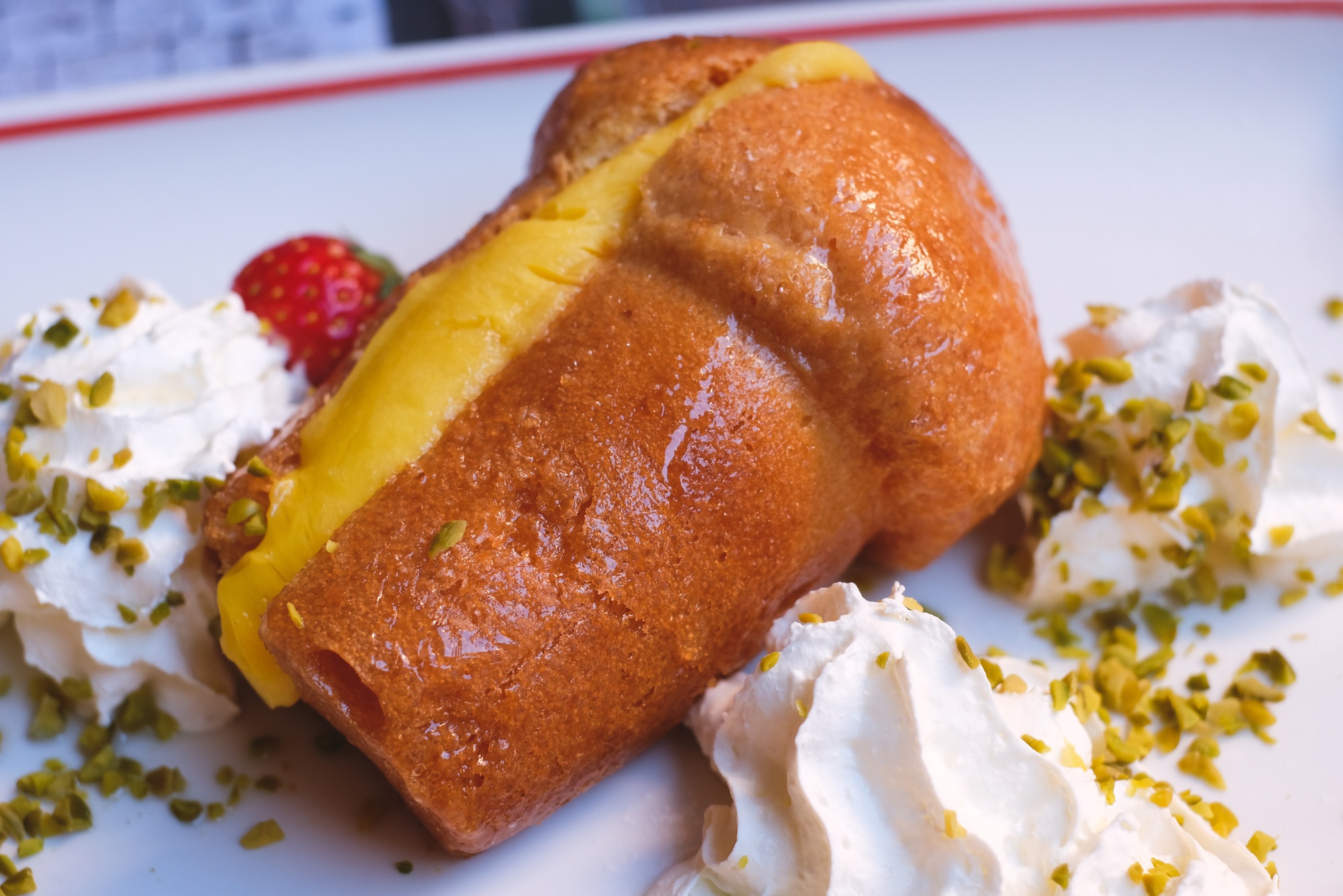 A rum baba filled with pastry cream.
