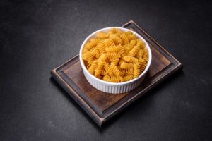 Detail of macaroni pasta useful as a background, texture. Dry pasta