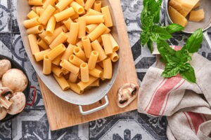 Pasta. italian pasta. Variety of traditional italian pasta: colorful spaghetti, tagliatelle, farfall